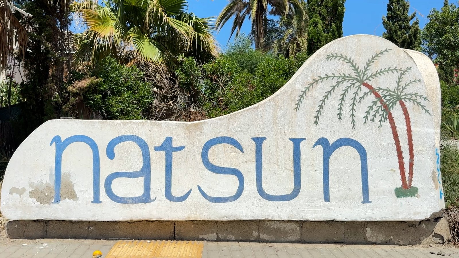 People walking along Vera beach